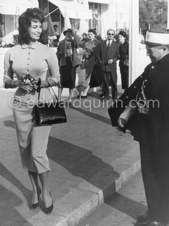 The Police of Nice is interested in Sophia Loren. Promenade des Anglais, in front of Hotel Negresco, Nice 1957. - Photo by Edward Quinn