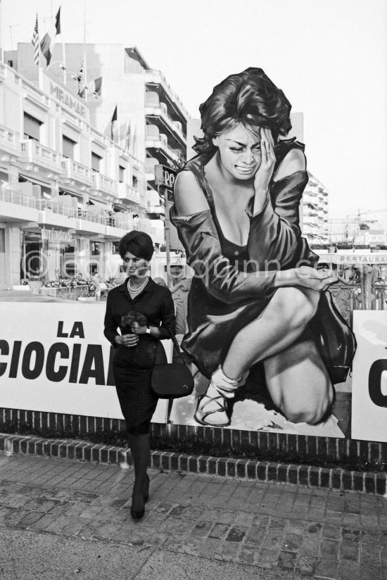 Sophia Loren in front of poster of her film "La Ciociara" at Cannes Film Festival 1961. - Photo by Edward Quinn