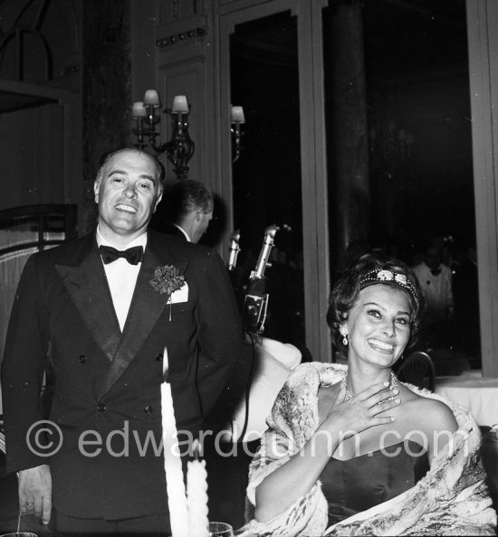 Sophia Loren and her husband Carlo Ponti, whom she had married the previous year, at Les Ambassadeurs in Cannes, 1958. - Photo by Edward Quinn