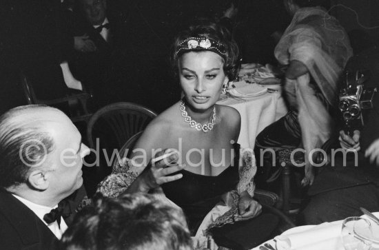 Sophia Loren and her husband Carlo Ponti, whom she had married the previous year, at Les Ambassadeurs in Cannes, 1958. - Photo by Edward Quinn