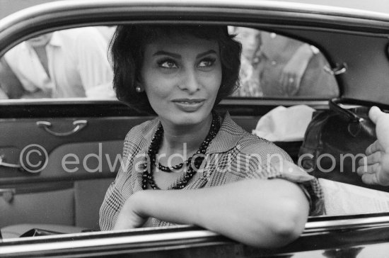 A lot of Italianità: Sophia Loren in an Alfa Romeo Giulietta Sprint. Cannes 1958. - Photo by Edward Quinn