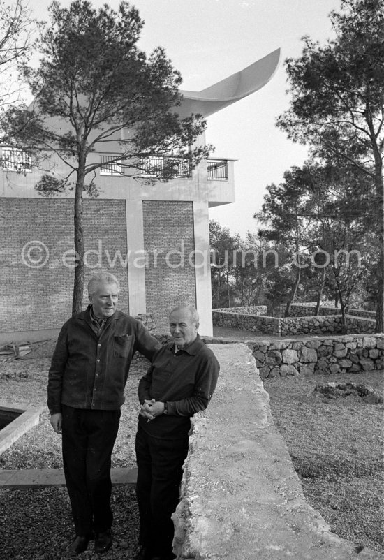 Joan Miró and Aimé Maeght in the gardens of Musée Maeght. Saint-Paul-de-Vence 1964. - Photo by Edward Quinn