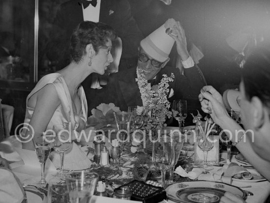 Aristotle Onassis and Gianni Agnelli\'s wife Marella, Princess Caracciolo. New Year’s Eve dinner. Monte Carlo 1953. - Photo by Edward Quinn