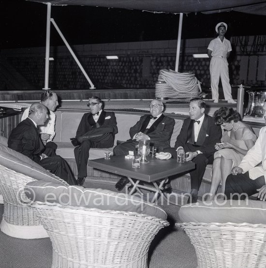 On board the Christina during a cocktail Onassis gave. From left to right Mr. Salmona, Mr. Mirotis, Aristotle Onassis, Stavros Niarchos and Onassis\' sister Artemis Garoufalidi. Monaco 1957. - Photo by Edward Quinn