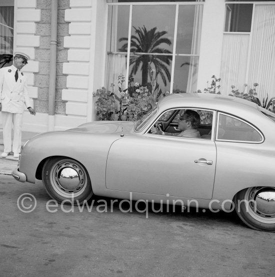 Aristotle Onassis arriving at the Carlton Hotel. Cannes 1953. Car: Porsche 356 1281ccm, 44hp. 1952. - Photo by Edward Quinn