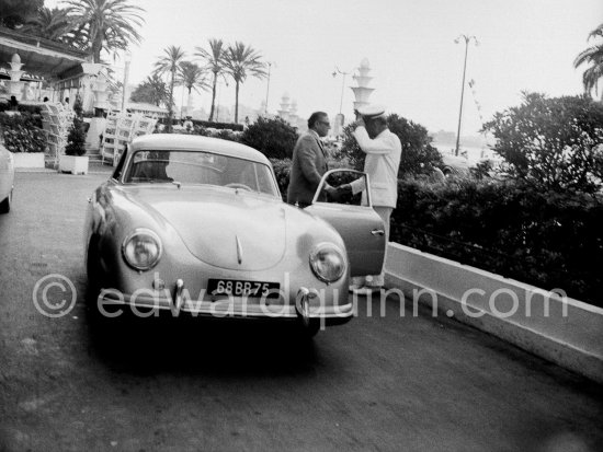 Aristotle Onassis arriving at the Carlton Hotel. Cannes 1953. Car: Porsche 356 1281ccm, 44hp. 1952. - Photo by Edward Quinn