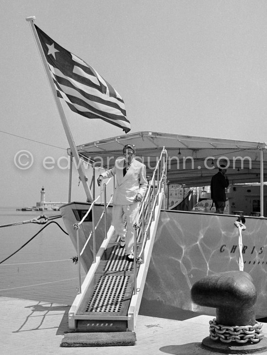 Aristotle Onassis leaving his yacht Christina. Monaco harbor 1954. - Photo by Edward Quinn