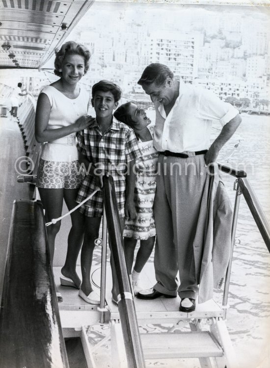Aristotle Onassis, Tina Onassis, Alexander Onassis and Christina Onassis on board the yacht Christina. Monaco harbor 1958. - Photo by Edward Quinn