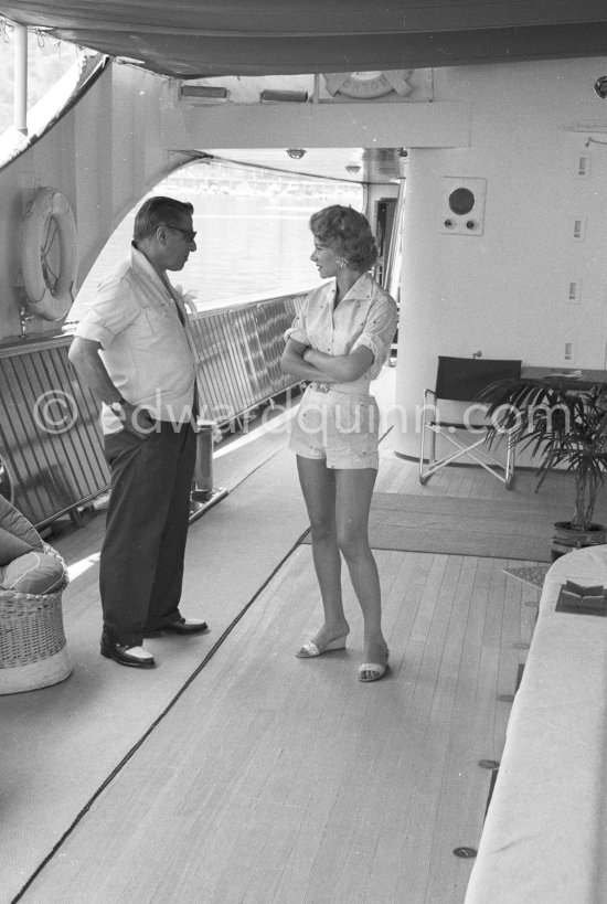 Aristotle Onassis and his wife Tina on board the yacht Christina. Monaco harbor 1958. - Photo by Edward Quinn