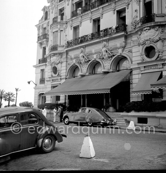 Aristotle Onassis in front of the Hotel de Paris. Monte Carlo 1953. His car: 1952 Bentley R-Type Continental, #BC25A, 2-Door Fastback Saloon by H.J.Mulliner. Detailed info on this car by expert Klaus-Josef Rossfeldt see About/Additional Infos. - Photo by Edward Quinn