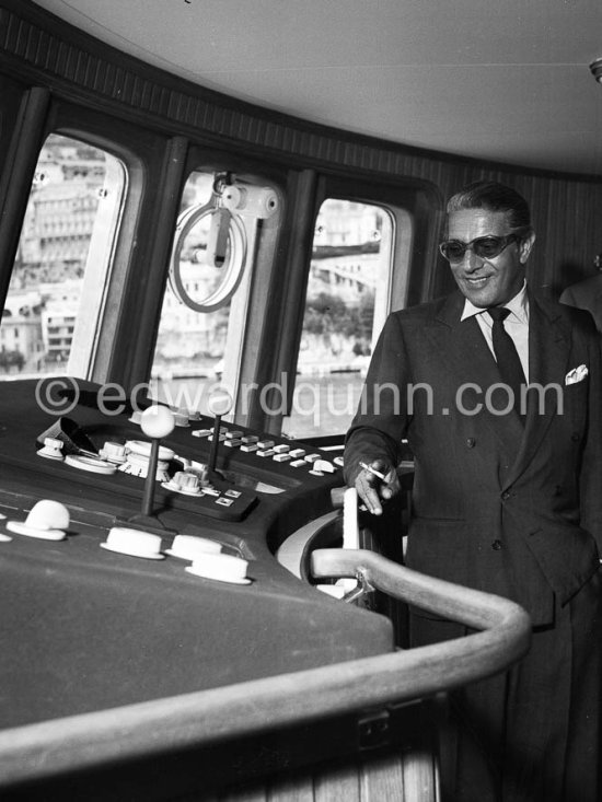 Aristotle Onassis on the command bridge of his yacht Christina. Monaco 1959. - Photo by Edward Quinn