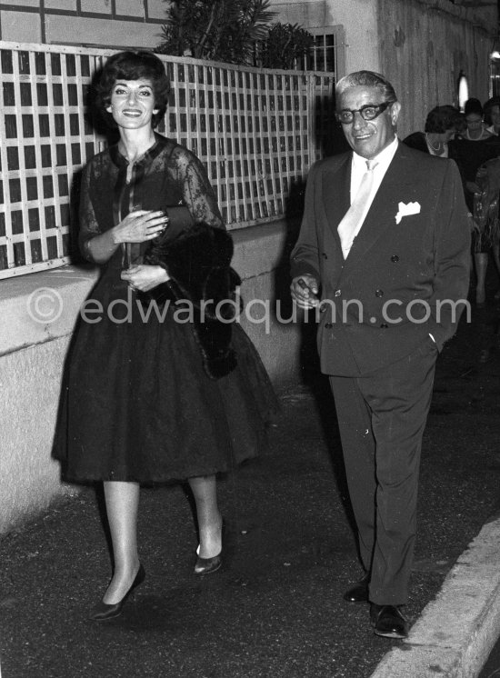 Greek-American opera singer Maria Callas with close companion, Greek businessman and shipowner, Aristotle Onassis leaving a Monte Carlo nightclub in 1960. - Photo by Edward Quinn