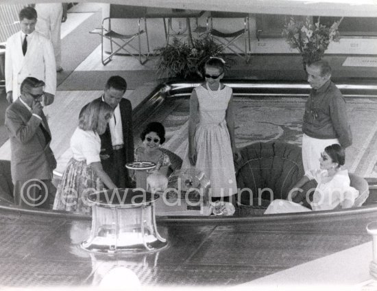 Aristotle Onassis, Tina Onassis, Maria Callas and her husband Giovanni Battista Meneghini. Sir Winston Churchill in front of the cage of Churchill\'s parrot Toby. On board Onassis\' yacht Christina for Mediterranean cruise, Monaco harbor 1959. - Photo by Edward Quinn