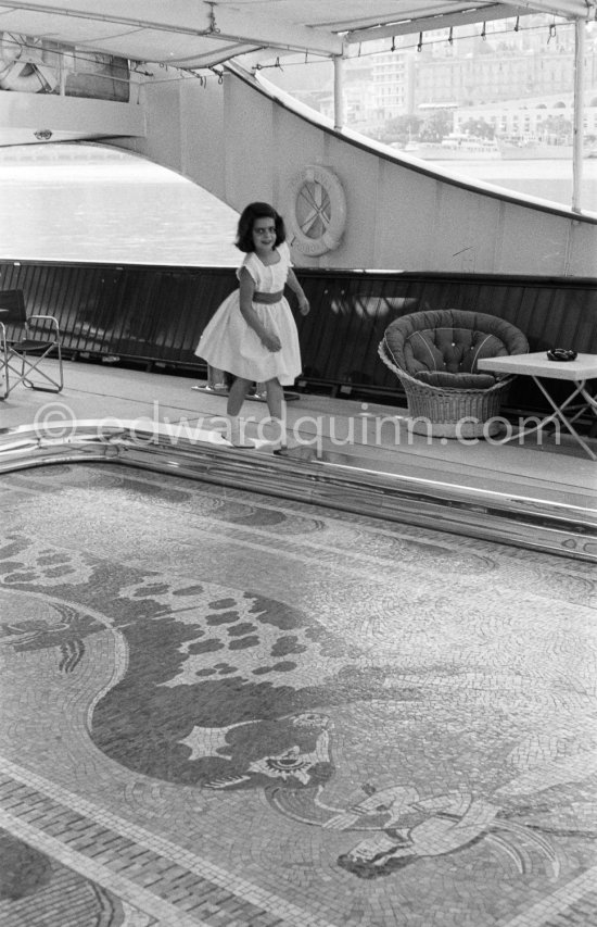 Christina Onassis, daughter of Aristotle and Tina Onassis, on board Onassis\' yacht Christina. Monaco harbor 1957. - Photo by Edward Quinn