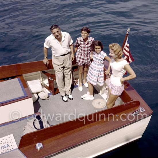 Aristotle Onassis, Tina Onassis, Alexander Onassis and Christina Onassis on board the tender of the yacht Christina. Monaco harbor 1958. - Photo by Edward Quinn