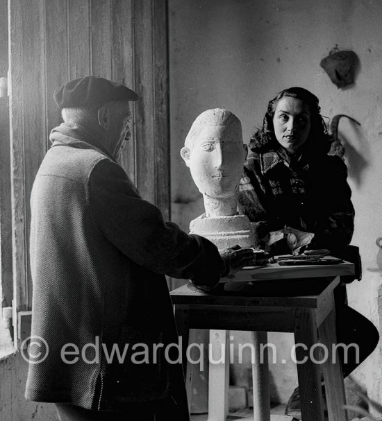 Picasso and Françoise Gilot with the sculpture "Tête de femme", Le Fournas, Vallauris 1953. - Photo by Edward Quinn