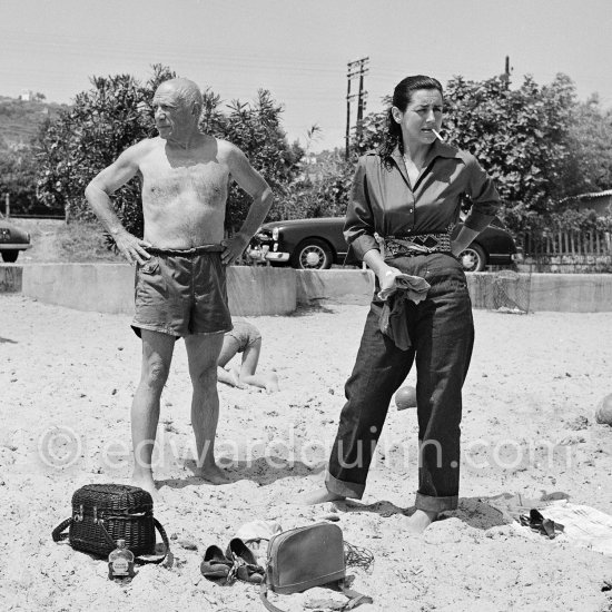 Pablo Picasso with Françoise Gilot at the beach. Golfe-Juan 1954. - Photo by Edward Quinn