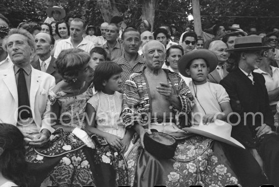 Local Corrida. Jean Cocteau, behind him Paul Derigon, the mayor of Vallauris, Francine Weisweiller, Paloma Picasso, Pablo Picasso, Claude Picasso, right French lady bullfighter Pierrette Le Bourdiec. Vallauris 1957. - Photo by Edward Quinn