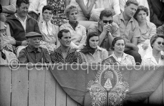 High tension moment at the bullfight. From left: Pablo Picasso, Luis Miguel Dominguin, Lucia Bosè, Jacqueline, behind Pablo Picasso: Picasso’s chauffeur Jeannot, Catherine Hutin. Corrida des vendanges. Arles 1959. - Photo by Edward Quinn