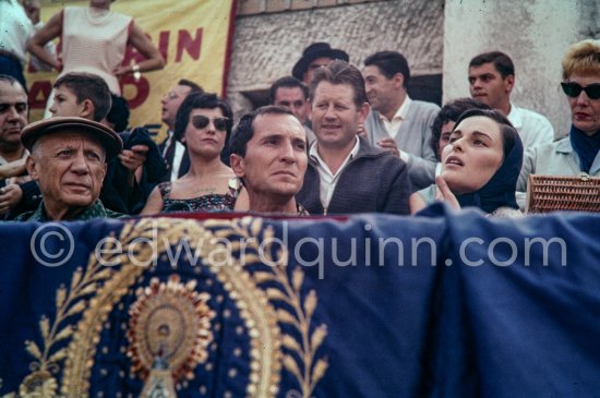 At the bullfight. From left: Pablo Picasso, Luis Miguel Dominguin, Lucia Bosè. Second row Pablo Picasso’s chauffeur Jeannot, Catherine Hutin. Corrida des vendanges. Arles 1959. - Photo by Edward Quinn