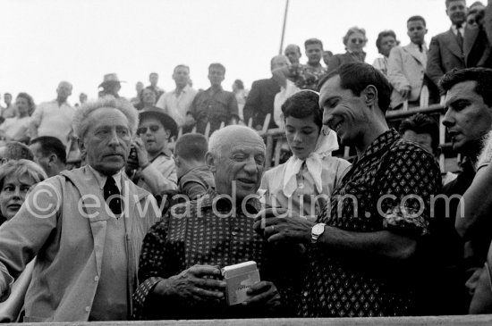 At the bullfight from left: Francine Weisweiller, Jean Cocteau, Pablo Picasso, Catherine Hutin, Luis Miguel Dominguin (spectator because of injuries). Corrida des vendanges. Arles 1959. - Photo by Edward Quinn