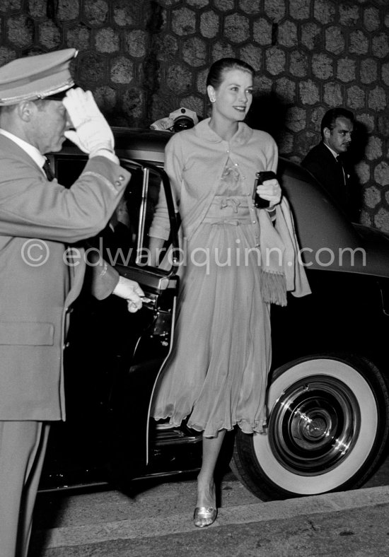Princess Grace and Prince Rainier attending operette performance at Stade Louis II. Monaco 1956. Car: 1956 Rolls-Royce Silver Cloud I, #LSXA243, Standard Steel Sports Saloon. Detailed info on this car by expert Klaus-Josef Rossfeldt see About/Additional Infos. (Grace Kelly) - Photo by Edward Quinn