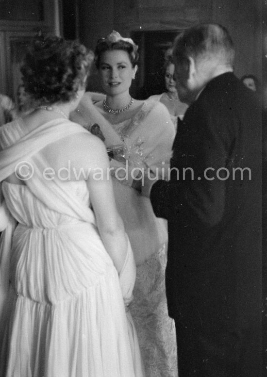 Princess Grace. Her last outing before her second maternity, on the left Prince Pierre, on the right her doctor Dr. Donat. "Bal de la Rose" gala dinner at the International Sporting Club in Monte Carlo 1958. - Photo by Edward Quinn