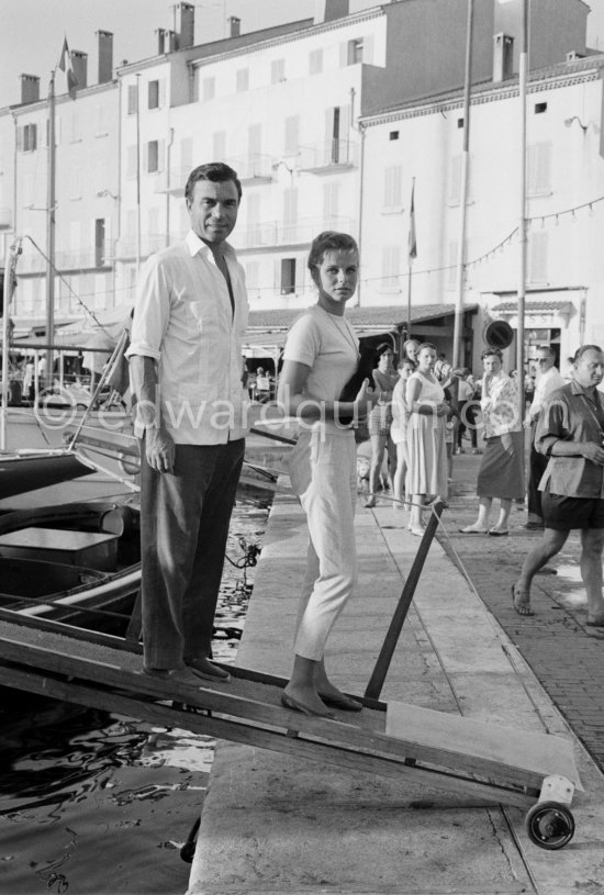 Dominican diplomat-playboy Porfirio Rubirosa with his fifth and last wife Odile Rodin, French actress and her Chihuahua Negrita at Saint-Tropez 1958. - Photo by Edward Quinn