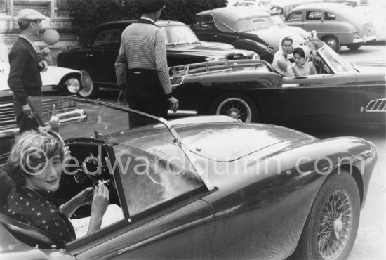 Françoise Sagan and Gabriella, Princess of Savoy (at the wheel of the black Ferrari) and her sister Princess Maria Pia of Yugoslavia. Cannes 1959. Cars: 1953-63 AC ACE. The Ferrari is a very rare 1958 250GT Pininfarina Series 1 Cabriolet; only 37 cars were built in 1957-59. This one is serial number 0963/GT, it was delivered new to Count Giovanni Volpi di Misurata and registered for him in Rome. (Thank you, Kare Pietilä, for this information.) - Photo by Edward Quinn