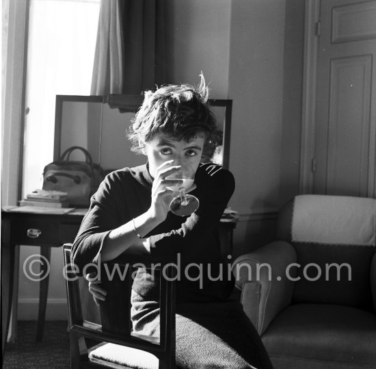When Françoise Sagan became famous, having written "Bonjour Tristesse", she went to live at Cannes in a room at the Carlton Hotel and worked there on her novel "Un certain Sourire". Cannes 1954. - Photo by Edward Quinn