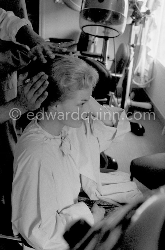 Romy Schneider at the hairdresser. Cannes Film Festival 1957. - Photo by Edward Quinn