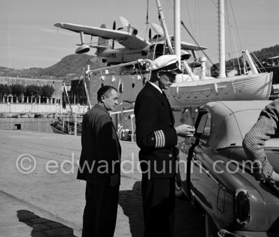 The captain of "Olympic Whaler", the whaling ship of Aristotle Onassis. With Italian twin-engine amphibian flying boat I-FIMA, prototype of Piaggio P-136. Nice harbor 1952. - Photo by Edward Quinn