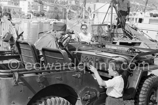 Lt. Sam Loggins (Frank Sinatra) with a young enthusiast during the filming of "Kings Go Forth". Villefranche-sur-Mer 1957. Car: 1951 or 52 Jeep M38 - Photo by Edward Quinn