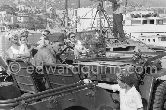 Lt. Sam Loggins (Frank Sinatra) with a young enthusiast during the filming of "Kings Go Forth". Villefranche-sur-Mer 1957. Car: 1951 or 52 Jeep M38 - Photo by Edward Quinn