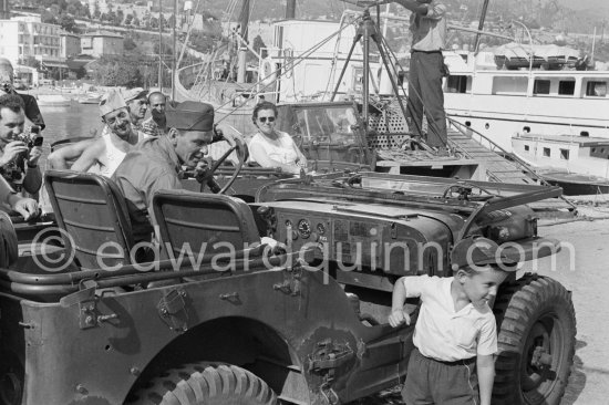 Lt. Sam Loggins (Frank Sinatra) with a young enthusiast during the filming of “Kings Go Forth”. Villefranche-sur-Mer 1957. 1951. or 52 Jeep M38 - Photo by Edward Quinn