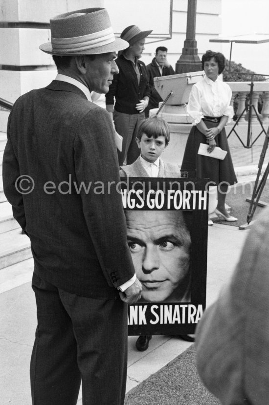 Frank Sinatra in Monaco in 1958 to perform at a charity gala evening at the Sporting d’Eté for the UN Refugees children. Beside him a poster for the film "Kings Go Forth", which was made in Monaco and Roquebrune the year before. - Photo by Edward Quinn