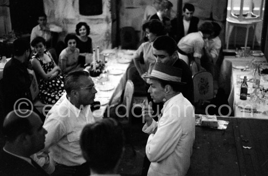 Frank Sinatra rehearsing with the orchestra at the Sporting d’Eté. Princess Grace, who was president of the Monégasque Red Cross, persuaded Sinatra to come back to Europe to sing at a gala in aid of refugee children. Monte Carlo 1958. - Photo by Edward Quinn