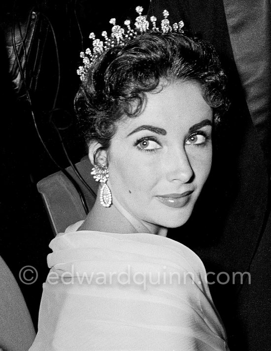 Elizabeth Taylor after the screening of "Around the World in 80 Days" at the Cannes Film Festival in 1957. She was among more than a thousand guests invited by her husband Mike Todd to a gala supper at Les Ambassadeurs to celebrate the film. At this time she was widely considered to be one of the most beautiful women in the world. - Photo by Edward Quinn
