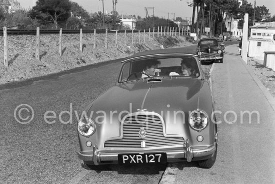 Peter Ustinov near the Studios de la Victorine during filming of "Lola Montès". Nice 1955. Car: 1955 Aston Martin DB 2/4 Drophead coupé - Photo by Edward Quinn