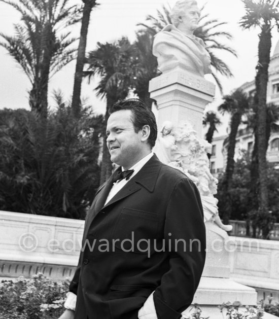 Orson Welles in front of the Casino in Monte Carlo. Welles came to the Riviera to present his film "Othello" at the Cannes Film Festival. He received the "Palme d’Or" for the film. The film, at present a "classique", was vilified by most of the critics. Monte Carlo 1952. - Photo by Edward Quinn