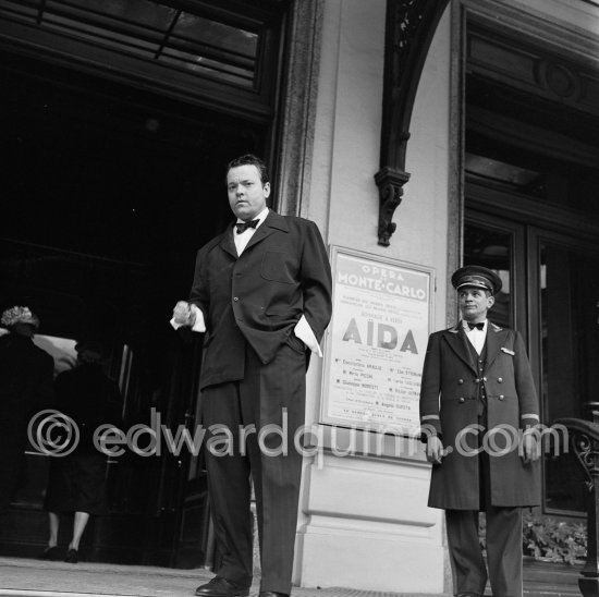 Orson Welles in front of the Casino in Monte Carlo. Welles came to the Riviera to present his film "Othello" at the Cannes Film Festival. He received the "Palme d’Or" for the film. The film, at present a "classique", was "vilipendé" by most of the critics. Monte Carlo 1952. - Photo by Edward Quinn