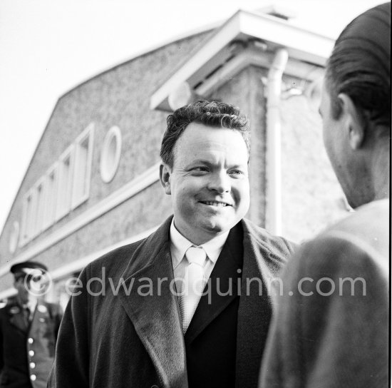 Orson Welles, Nice Airport 1952. - Photo by Edward Quinn