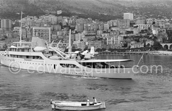 Onassis\' yacht Christina with aircraft G-APNY Piaggio P-136L SERIES 2 C/N 242. Monaco harbor about 1955. - Photo by Edward Quinn