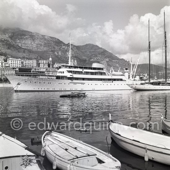 Onassis\' yacht Christina with G-AOFN Piaggio P.136-L2 C/N 195. Monaco harbor 1955. - Photo by Edward Quinn