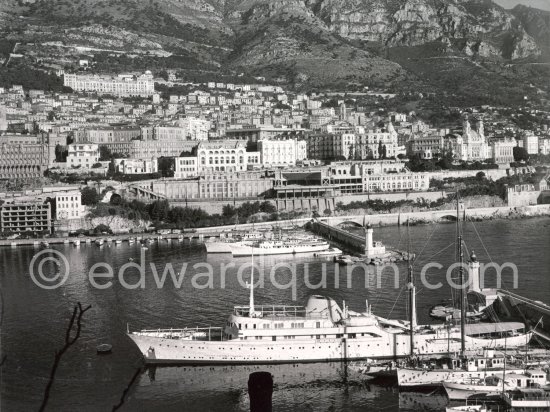 Yacht Christina of Aristotle Onassis. Monaco harbor with the casino in the background 1957. - Photo by Edward Quinn