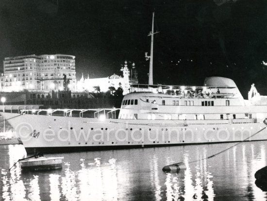 Yacht Christina of Aristotle Onassis lit up in harbor. Monaco 1959. - Photo by Edward Quinn