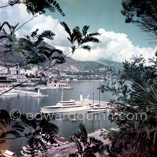 Yacht Christina of Aristotle Onassis. Monaco harbor 1957. - Photo by Edward Quinn