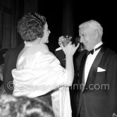 Charly Chaplin, toasting a friend before dinner, Figaro Gala. Cannes 1953. - Photo by Edward Quinn