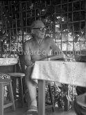 Le Corbusier (Charles-Édouard Jeanneret) at the small restaurant L'Etoile de Mer next to his vacation cabin Le Cabanon. Roquebrune-Cap-Martin 1953. - Photo by Edward Quinn