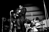 Miles Davis Quintet: Miles Davis (tpt), Tony Williams (d). Ron Carter (b). Juan-Les Pins Jazz Festival, Antibes 1963. - Photo by Edward Quinn